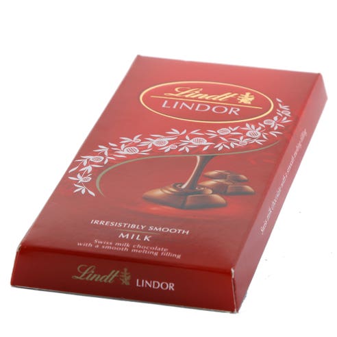 Lindt Lindor Swiss Milk Chocolate 100g - Available at Alosra Online Supermarket